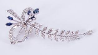 An impressive white metal bow & twisted stem leaf spray design brooch set with older