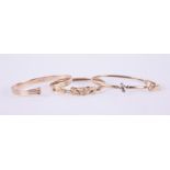 A mixed lot including a 14k yellow gold wishbone style ring, 2.10gm, size M, a 14k yellow, rose &
