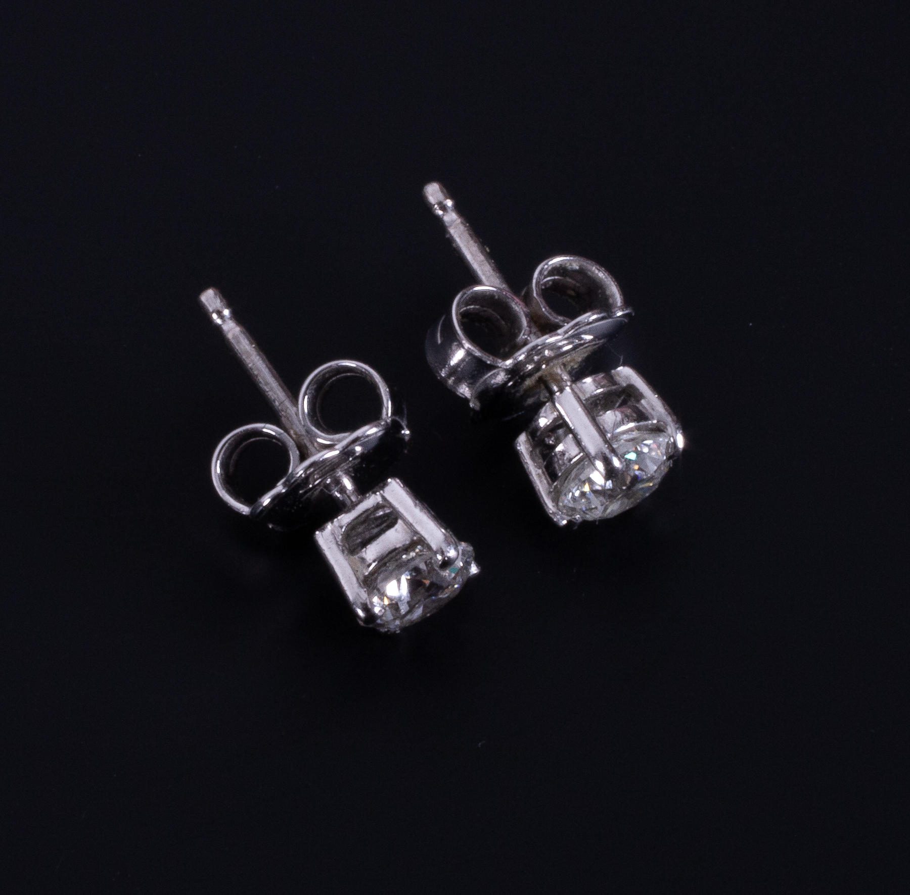 A pair of 18ct white gold studs set with approx. 0.74 carats of round brilliant cut diamonds - Image 2 of 2