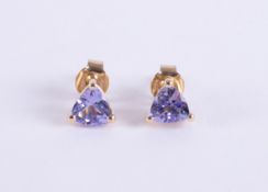 A pair of 9ct yellow gold studs set with triangular cut tanzanite's, post & butterfly fitting, 1.