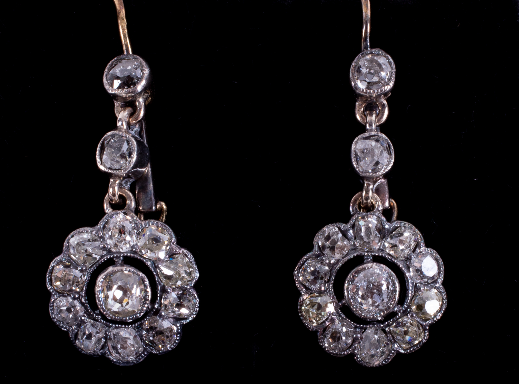 A pair of Edwardian antique yellow gold & platinum (not hallmarked or tested) flower