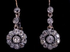 A pair of Edwardian antique yellow gold & platinum (not hallmarked or tested) flower