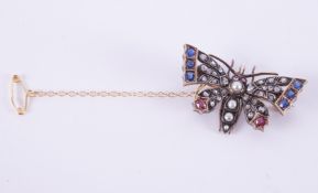 A Victorian yellow, white & rose gold butterfly brooch set with sapphires, rubies, old cut