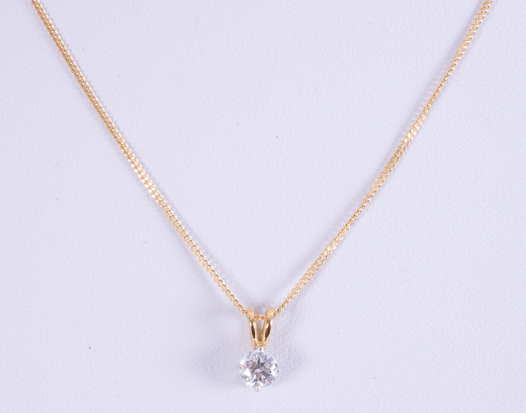 An 18ct yellow & white gold pendant set with a round brilliant cut diamond, approx. 0.30 carats, - Image 2 of 2