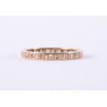 A yellow gold full eternity ring (no hallmarks & not tested), set with round single cut diamonds,