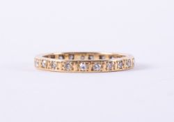 A yellow gold full eternity ring (no hallmarks & not tested), set with round single cut diamonds,