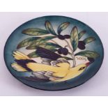 A Moorcroft limited edition circular plate, Golden Oriole bird and fruiting vine, No 157/750,