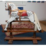 A small rocking horse, height 91cm.