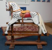 A small rocking horse, height 91cm.