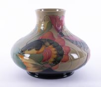 A Moorcroft squat vase decorated with Carps, height 20cm.