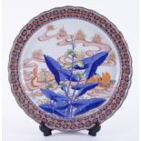 A large Chinese porcelain plate decorated with birds, with character marks to the base, diameter