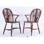 A pair of Windsor wheel back chairs.