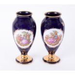 A pair of Limoges castel porcelain vases, height 25cm.