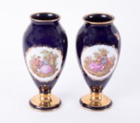 A pair of Limoges castel porcelain vases, height 25cm.
