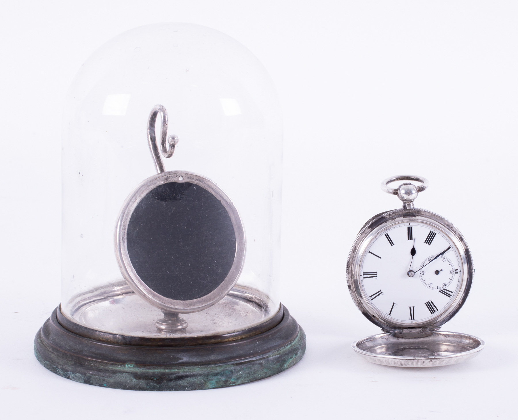 A silver open face pocket watch by J.W.Benson, sub second hand broken, with watch stand.