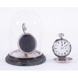 A silver open face pocket watch by J.W.Benson, sub second hand broken, with watch stand.