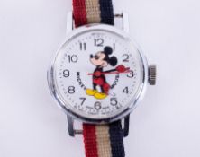 A vintage child's Mickey Mouse wristwatch with original strap, stamped on the back Base Metal, Swiss