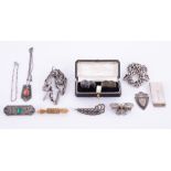 An interesting mixed lot of silver jewellery items to include a silver money clip with Birmingham,