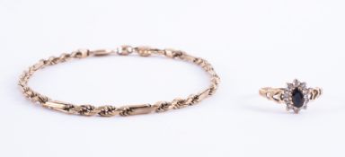 A 9ct gold twist bracelet together with a 9ct gold ring, approx 7.5g (total weight).