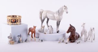 A small mixed lot including Beswick horses, Wade whimsies etc.