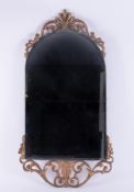 A reproduction gilt frame mirror.