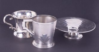 A small silver Geo V cup with scroll handle, Birmingham hallmark, circa 1931-32, makers mark J G Ltd