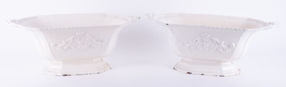 A pair of Victorian white cast iron planters.