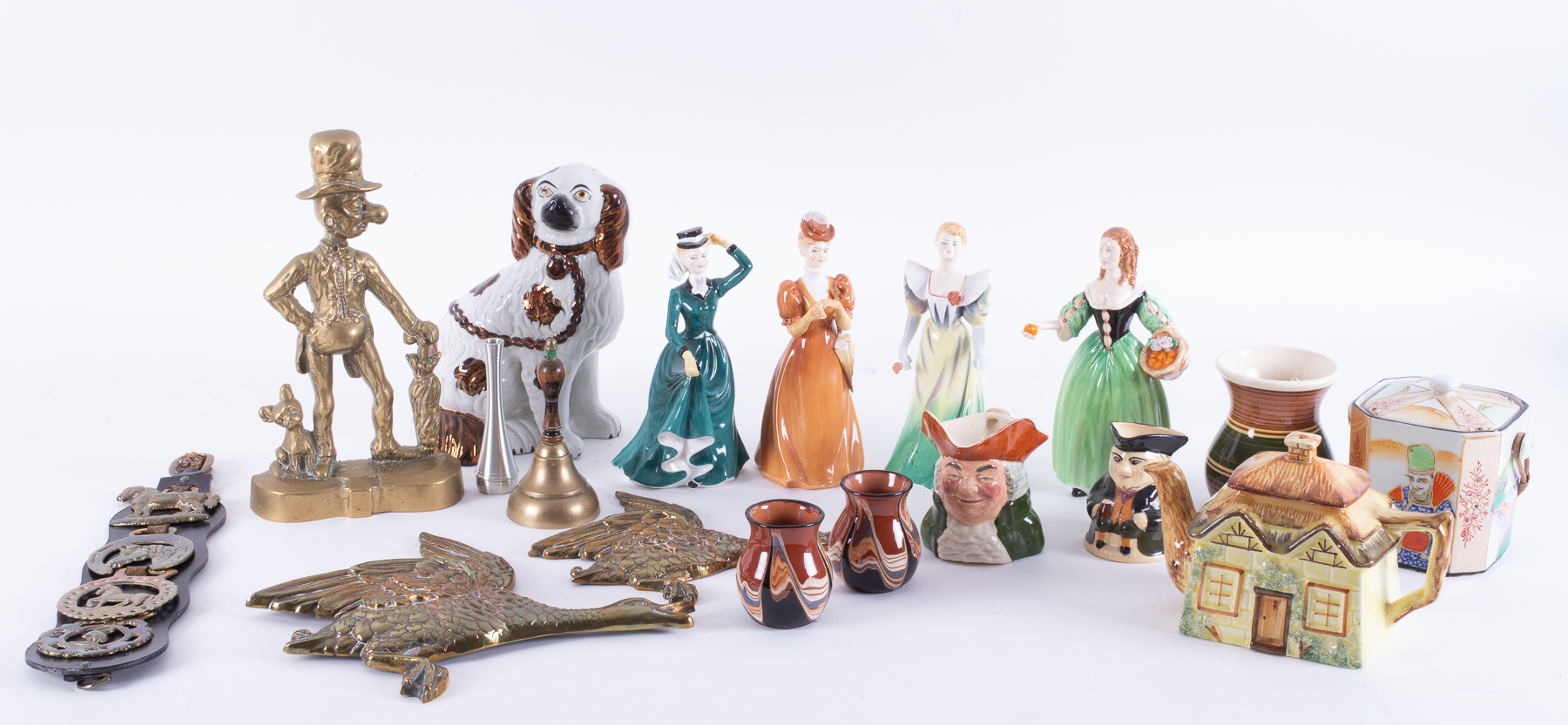 A collection of ornaments to include brassware, Cottage ware, Staffordshire dog, figurines etc.