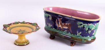 Majolica, a 19th century planter embossed and decorated with deer and a lilac interior, length 47cm,