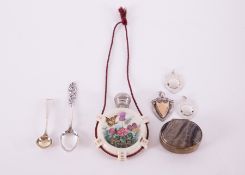 A small mixed collection to include three small silver medallion shields, spoons etc.