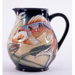 A Moorcroft jug 'Queit Waters', dated 2002, height 15cm, boxed.