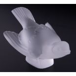 A Lalique frosted glass figure of a small bird, boxed.