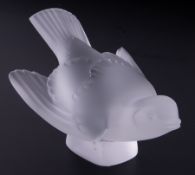 A Lalique frosted glass figure of a small bird, boxed.
