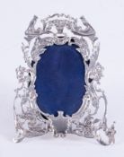 A small Victorian silver ornate photo frame, stamped Child & Child, London SW, the frame measures