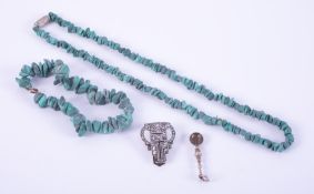 A mixed lot comprising of a rough cut Turquoise bead necklace, approx. 15" and a rough cut turquoise