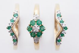 A 9ct yellow gold trinity set of rings set with round cut emeralds & round cut diamonds,