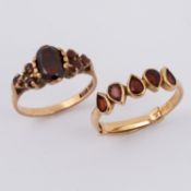 Two 9ct yellow gold rings, one set with five pear shaped garnets, 1.96gm (with ring clip), size N