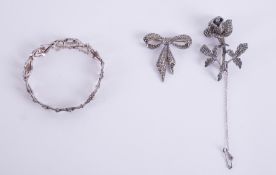 A mixed lot to include an ornate silver bracelet set with marcasite, approx. 19cm length, safety