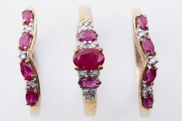 A 9ct yellow gold trinity set of rings set with oval cut rubies & round cut diamonds, 5.53gm,