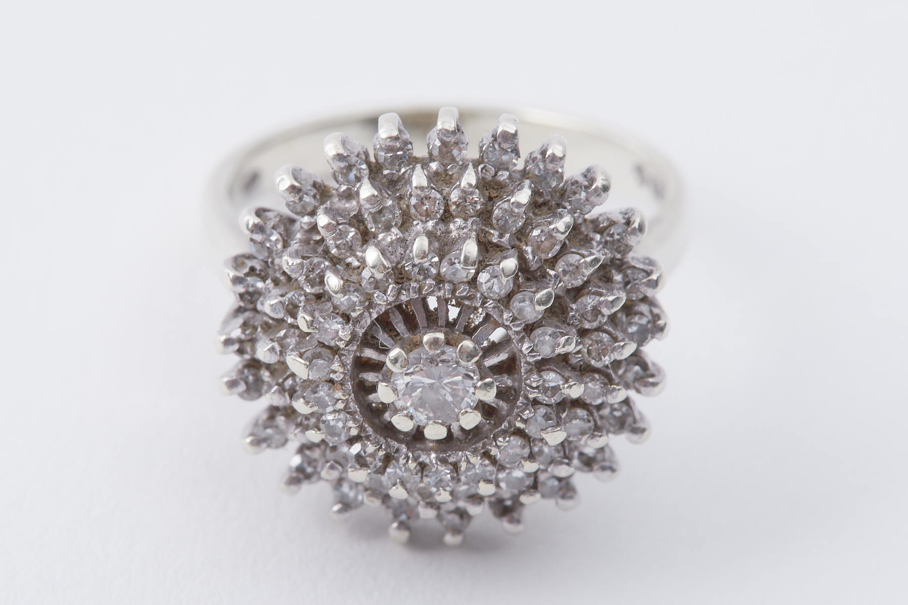 A 9ct white gold cluster style cocktail ring set with round brilliant cut diamonds, approx. 0.36 - Image 2 of 2