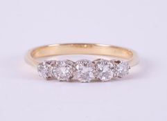 A five stone ring set with old round cut diamonds, total diamond weight approx. 0.50 carats, approx.