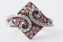 A 9ct white gold ring set with a mixture of round brilliant cut white & pink diamonds,