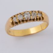 An antique 18ct yellow gold five stone ring set with old round cut diamonds, approx. total diamond