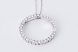 An 18ct white gold circle pendant set with approx. 1.00 carat of round brilliant cut diamonds,