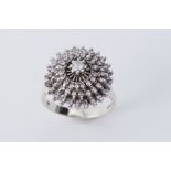 A 9ct white gold cluster style cocktail ring set with round brilliant cut diamonds, approx. 0.36