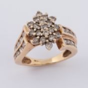 A 10k yellow gold cocktail ring set with approx. 1.05 carats of round brilliant cut diamonds, (