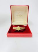 Omega, a ladies 9ct yellow gold Omega wristwatch with textured effect 9ct yellow gold bracelet, BL