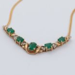 A 9ct yellow gold necklace set with five oval cut emeralds, total emerald weight approx.1.75
