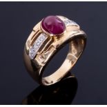 A wide band style ring set with a central cabochon cut ruby measuring 8.50mm x 6.50mm, approx. 2.