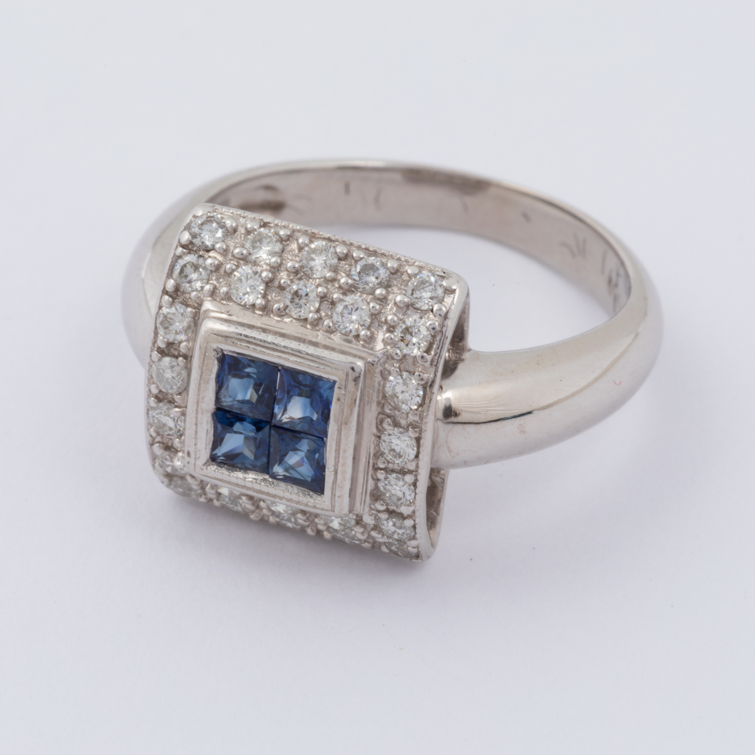 An 18ct white gold square designed ring set centrally with four square cut sapphires, total weight - Image 2 of 2